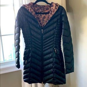 Black waterproof mid-thigh puffer jacket